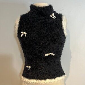 Clathas brand eyelash sweater vest with metallic thread/ bow detail size small